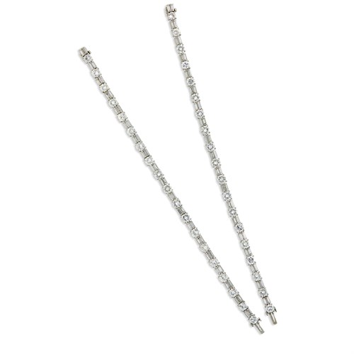 Lot 137 - A pair of diamond and platinum bracelets
