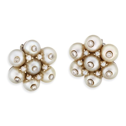 Lot 93 - A pair of fourteen karat white gold, diamond, and cultured pearl cluster earrings