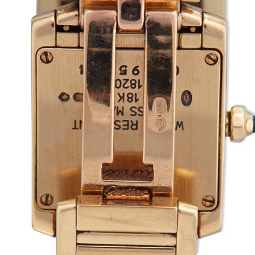 Lot 86 - A lady's eighteen karat gold bracelet watch, Cartier