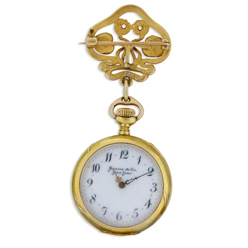 Lot 11 - An Art Nouveau fourteen karat gold lapel watch with matching brooch, Marcus & Co.