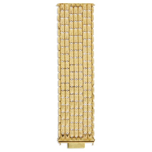 Lot 61 - An eighteen karat gold wide strap bracelet