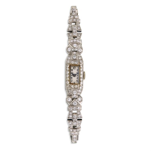 Lot 31 - An Art Deco diamond and platinum bracelet watch