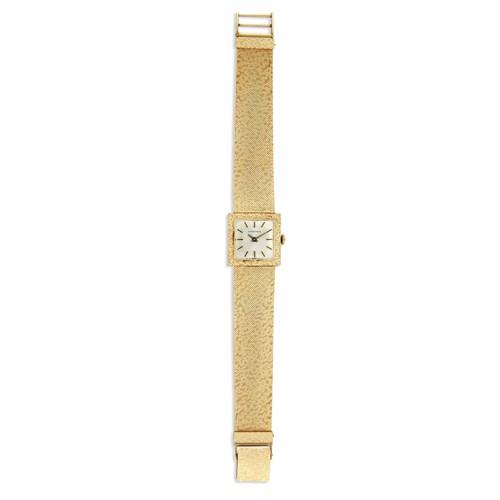 Lot 83 - A fourteen karat gold bracelet watch, Longines