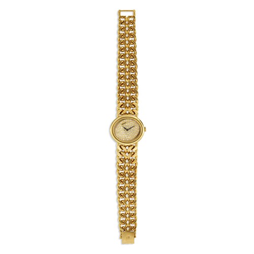 Lot 85 - An eighteen karat gold and diamond bracelet wristwatch, Piaget