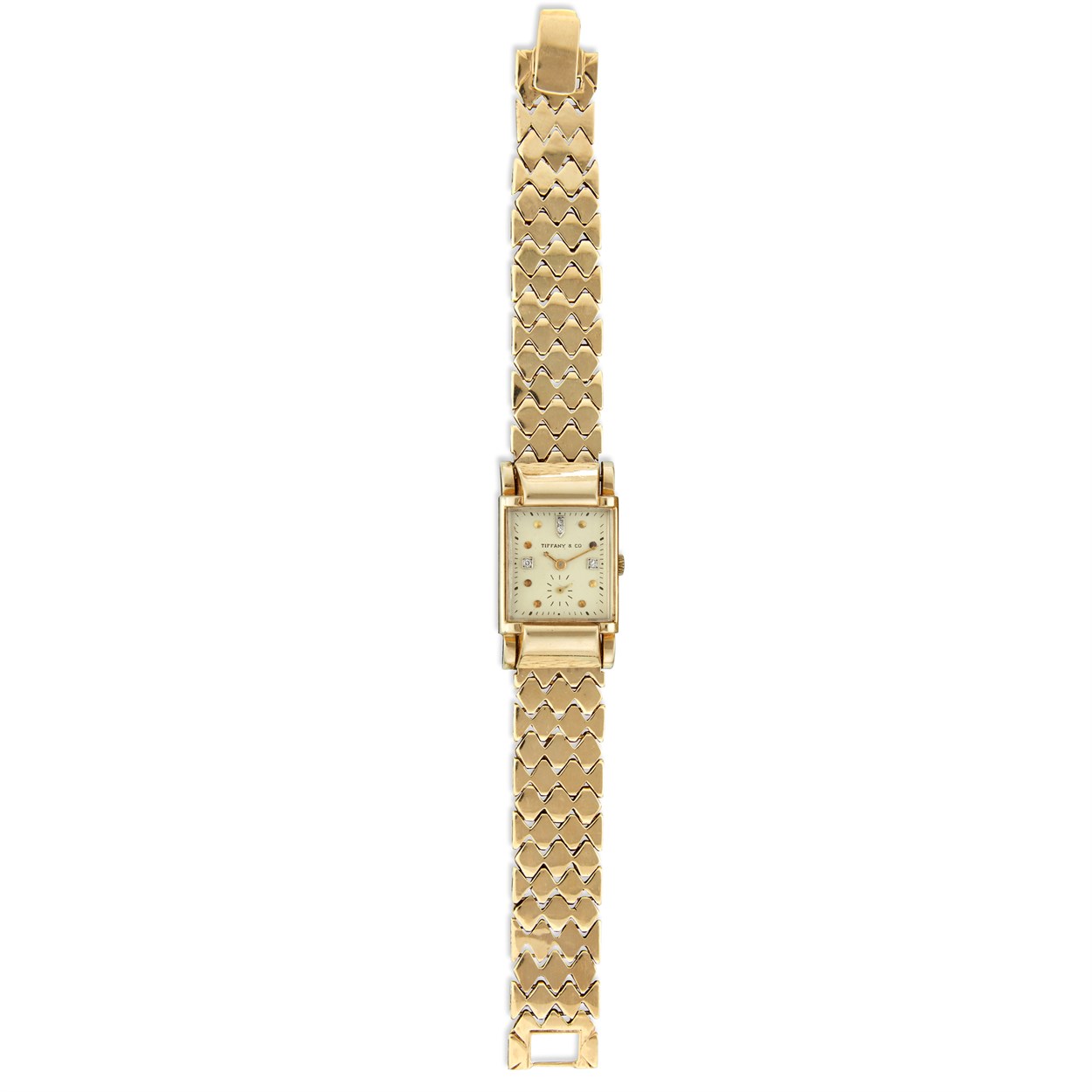 Lot 82 - A Retro fourteen karat gold and diamond bracelet wristwatch, Tiffany & Co.