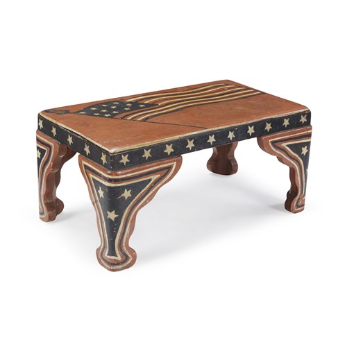 Lot 55 - Carved and painted foot stool decorated with the American Flag