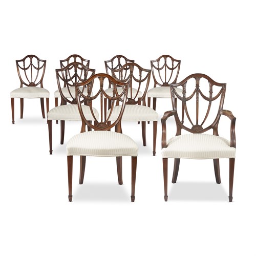 Lot 17 - Set of eight Federal carved mahogany shield-back chairs