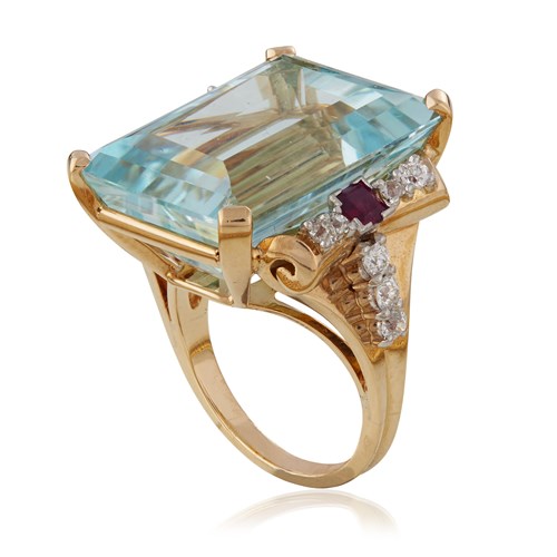 Lot 67 - A retro aquamarine, ruby, diamond, and fourteen karat gold ring