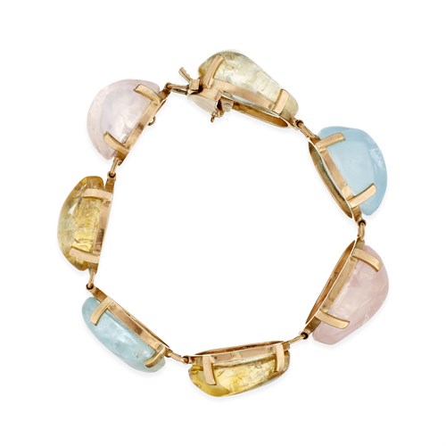 Lot 66 - A fourteen karat gold and gem-set bracelet