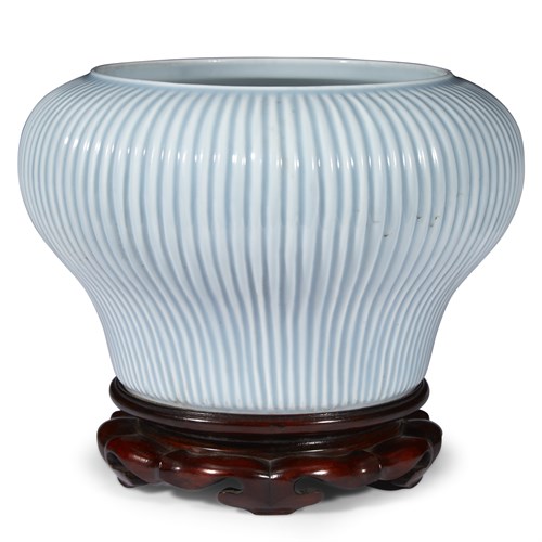 Lot 46 - A Chinese "1,000" rib 'clair-de-lune' glazed jar