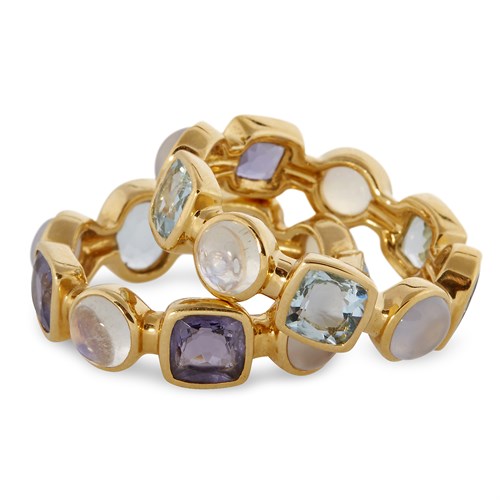 Lot 39 - A pair of eighteen karat gold and gem-set rings