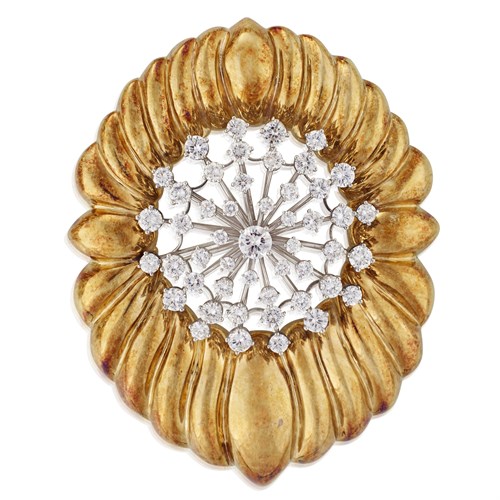 Lot 111 - A fourteen karat gold and diamond pendant brooch
