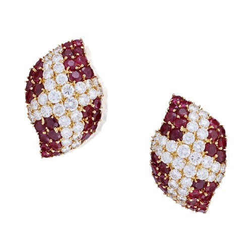 Lot 134 - A pair of eighteen karat gold, diamond, and ruby earrings