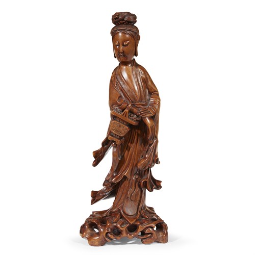 Lot 93 - A Chinese carved boxwood figure of Guanyin