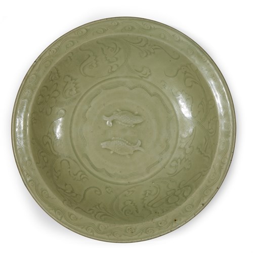Lot 31 - A Chinese Longquan incised and molded celadon "Twin Fish"  circular dish