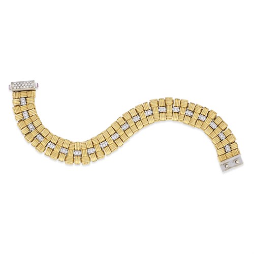 Lot 35 - A two-tone eighteen karat gold and diamond bracelet, Roberto Coin