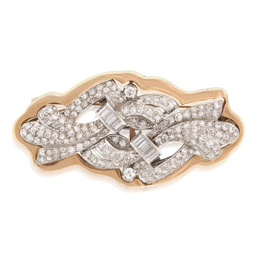 Lot 35 - A diamond, platinum, and eighteen karat gold double clip brooch