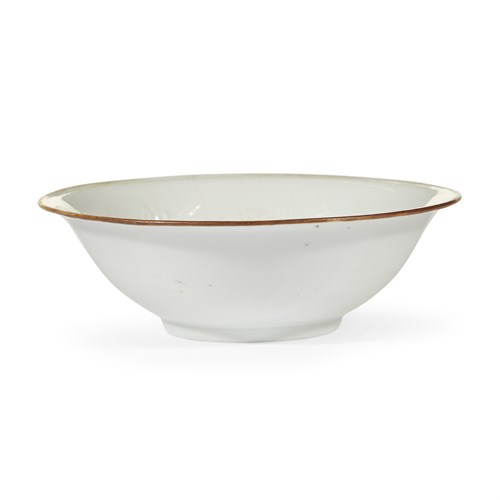 Lot 40 - A Chinese molded porcelain white-glazed bowl