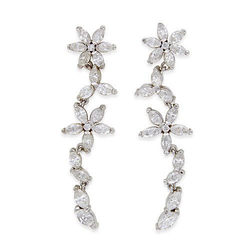 Lot 96 - A pair of diamond and eighteen karat white gold pendant earrings