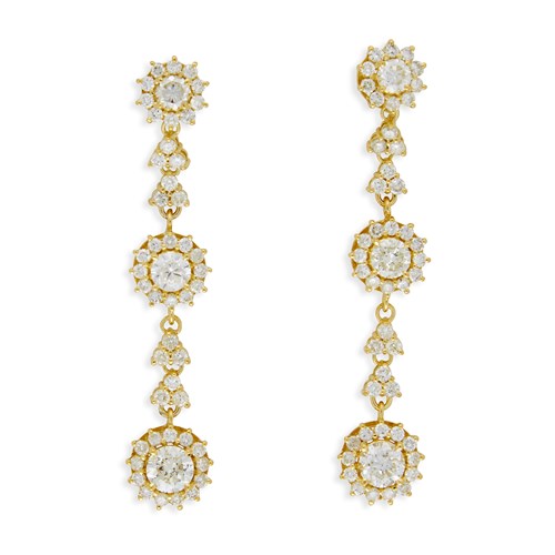 Lot 60 - A pair of diamond and eighteen karat gold pendant earrings