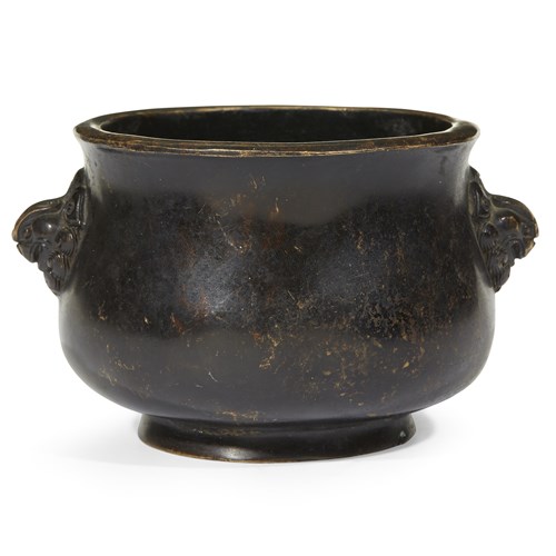Lot 78 - A Chinese patinated bronze censer