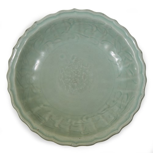 Lot 33 - A Chinese Longquan celadon barbed dish