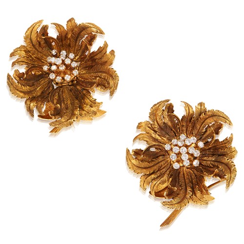 Lot 23 - A pair of fourteen karat gold and diamond brooches