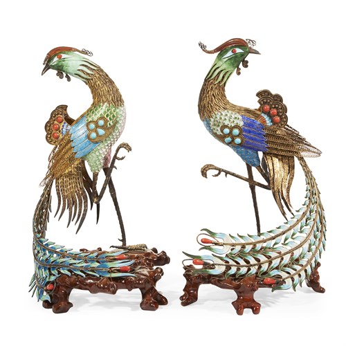 Lot 96 - A pair of Chinese embellished gilt filigree and enameled phoenixes