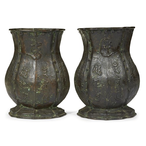 Lot 88 - An unusual pair of Chinese patinated bronze lobed baluster vases