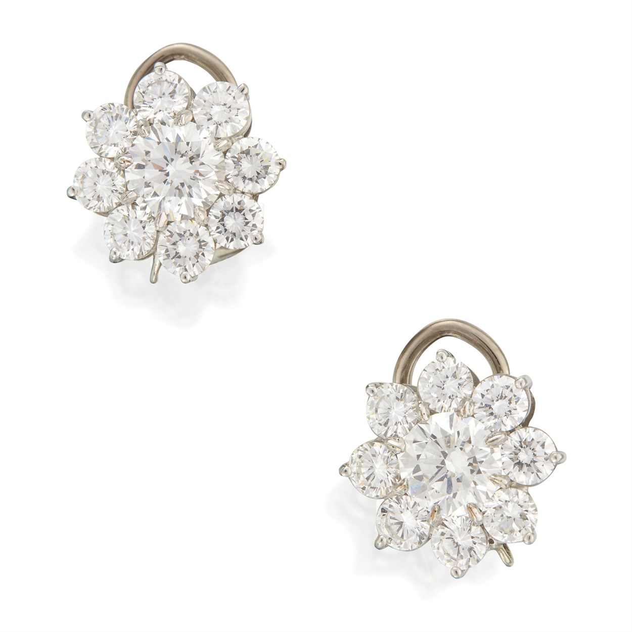 Lot 16 - A pair of eighteen karat white gold and diamond earrings