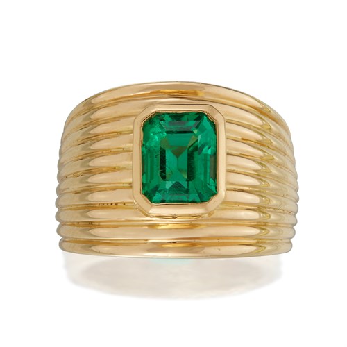 Lot 168 - An eighteen karat gold and emerald ring, Boivin