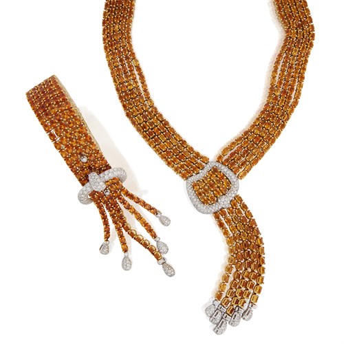 Lot 102 - A citrine, diamond, and eighteen karat gold necklace with matching bracelet