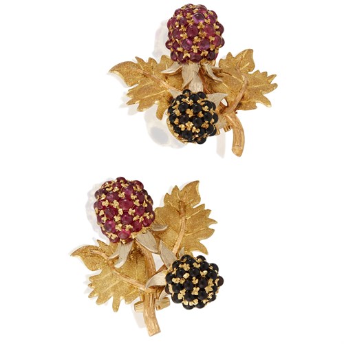 Lot 22 - A pair of ruby, sapphire, and eighteen karat gold earclips, Buccellati