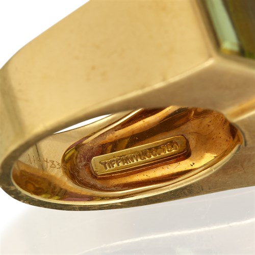 Lot 57 - An amethyst, peridot, and eighteen karat gold ring, Tiffany & Co.