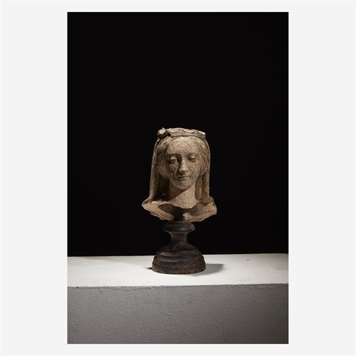 Lot 8 - A French late Gothic clay head of a saint, probably Mary