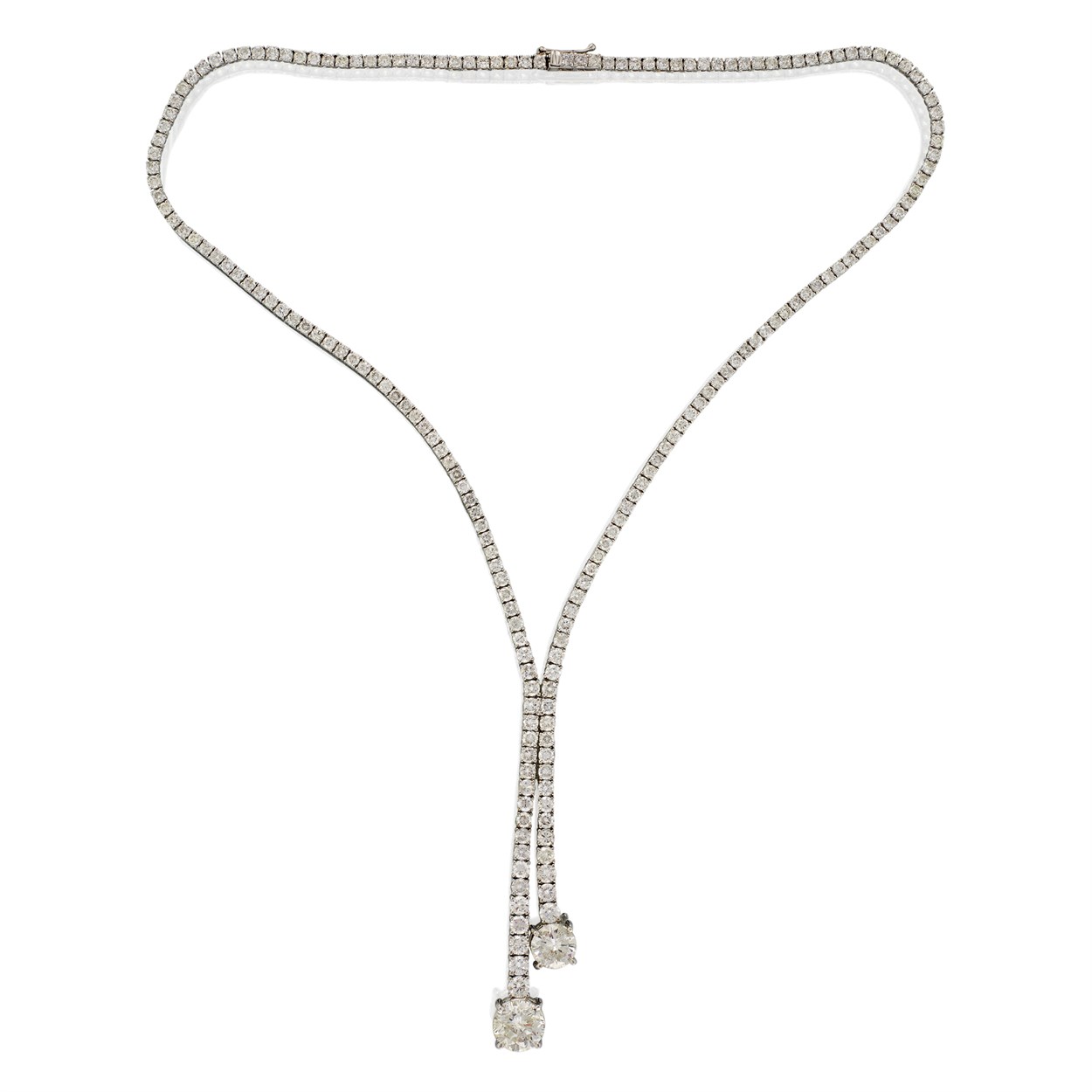Lot 92 - A diamond and eighteen karat white gold lariat necklace