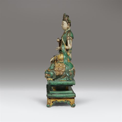 Lot 82 - A Chinese sancai-glazed figure of a seated Bodhisattva