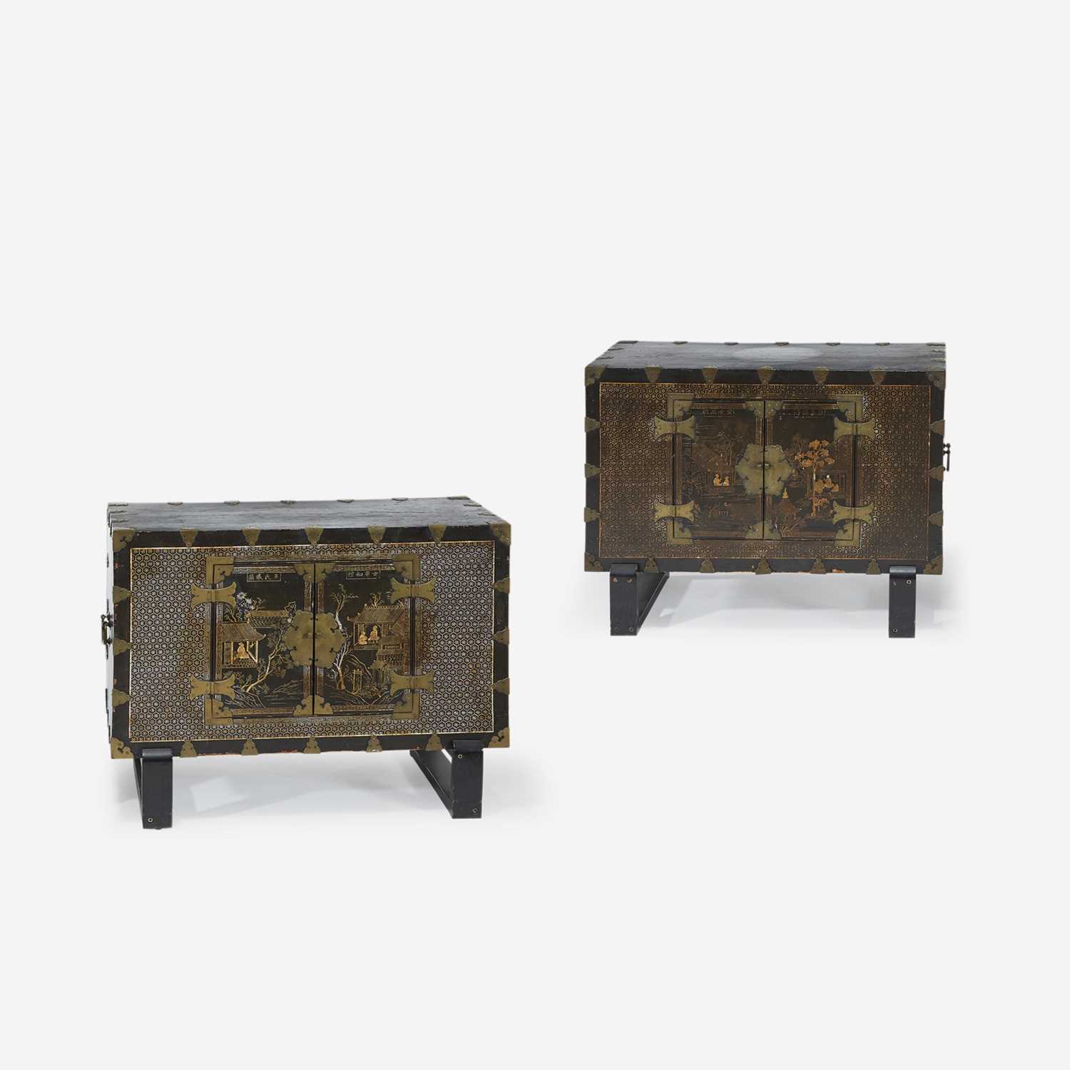 Lot 121 - A pair of Korean mother of pearl-inlaid lacquered wood chests