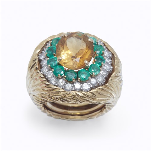 Lot 14 - A citrine, emerald, diamond, and eighteen karat gold ring