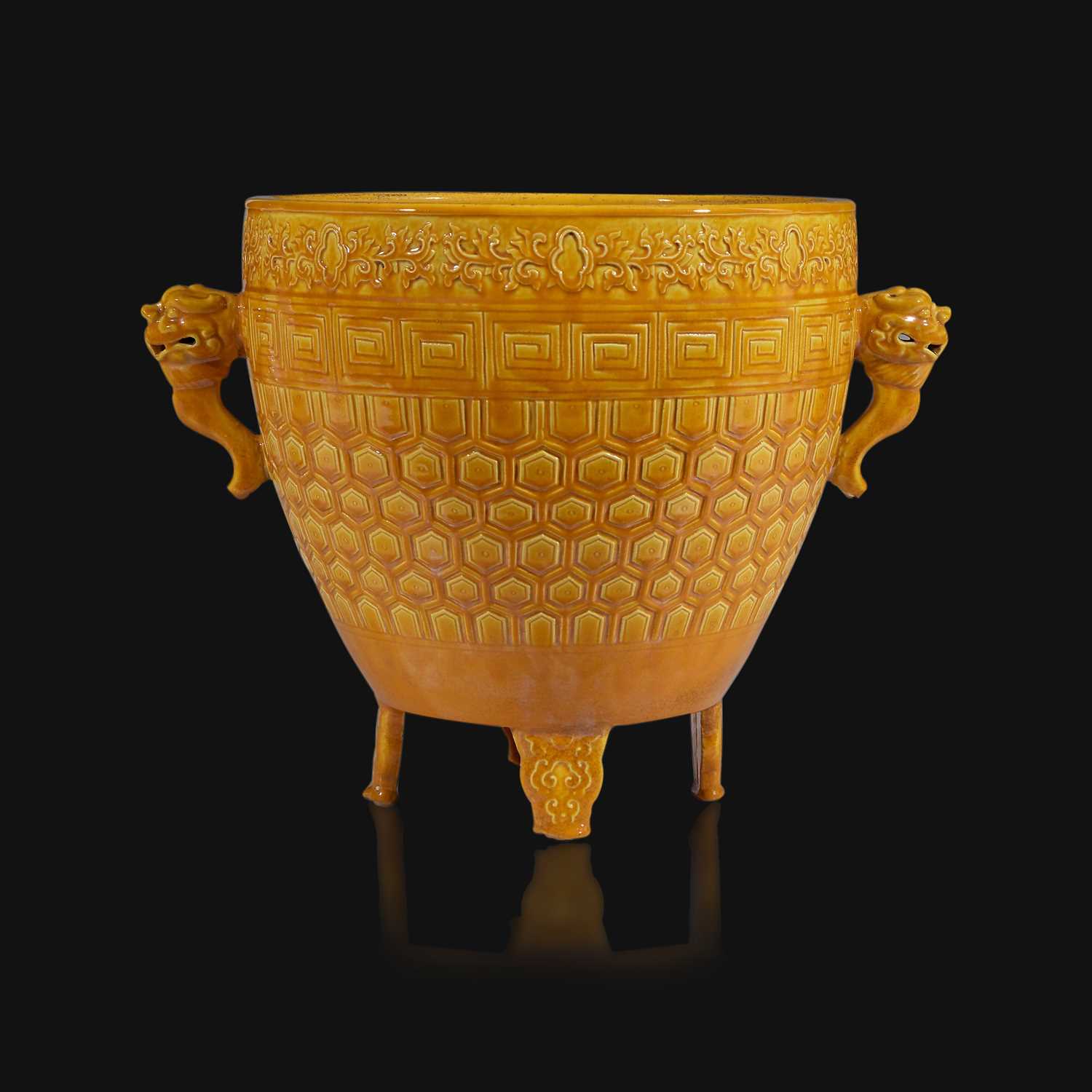 Lot 19 - A Chinese yellow-glazed archaistic vessel, Xing