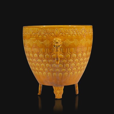 Lot 19 - A Chinese yellow-glazed archaistic vessel, Xing