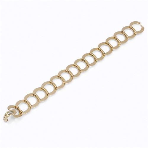 Lot 5 - An eighteen karat gold strap bracelet, Hermès