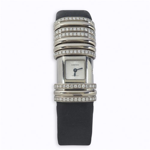 Lot 46 - An eighteen karat white gold and diamond strap wristwatch, Cartier