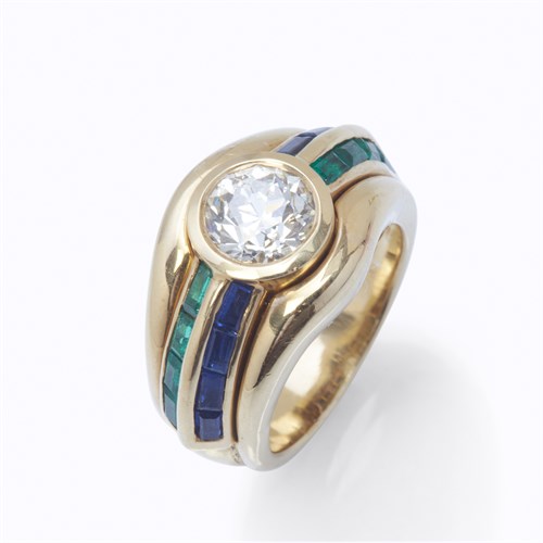 Lot 11 - A diamond, sapphire, emerald, and eighteen karat gold ring