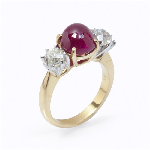 Lot 74 - A Burma ruby, diamond, and eighteen karat gold ring