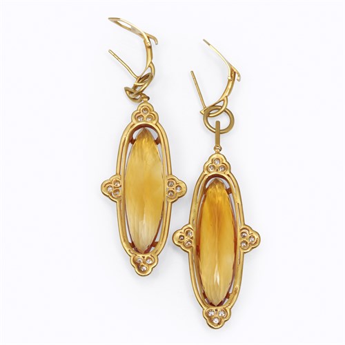 Lot 18 - A pair of eighteen karat gold, citrine, and diamond drop earrings, Cellini