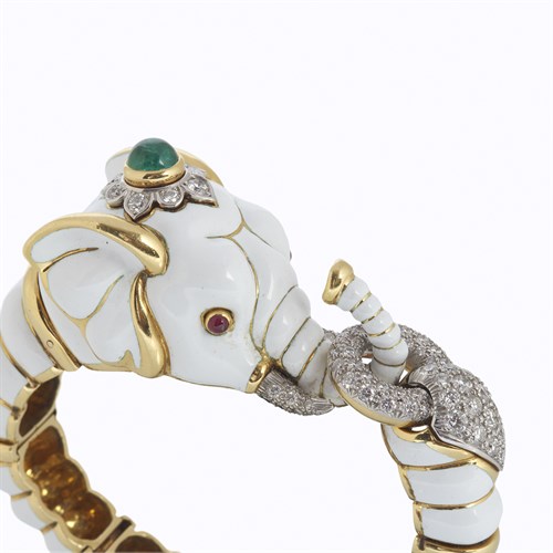 Lot 110 - A white enamel, eighteen karat gold, diamond, and colored gemstone bracelet, David Webb