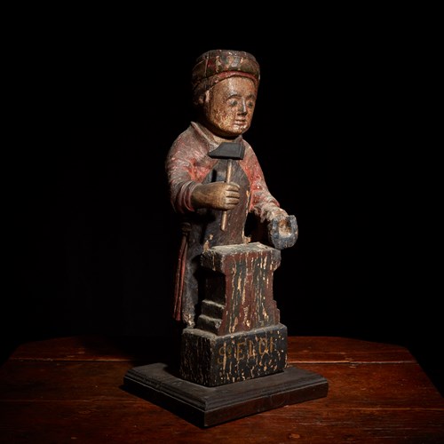 Lot 12 - A French polychromed figure of Saint Eligius (Eloi) depicted as a farrier