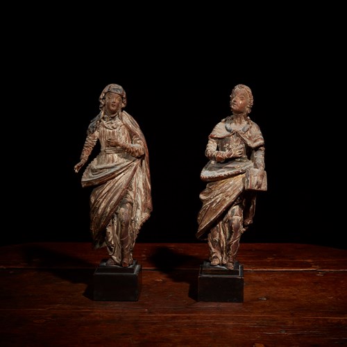 Lot 11 - Two French late Gothic polychrome walnut figures of the Virgin Mary and Saint Anne