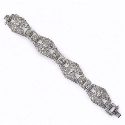 Lot 88 - An Art Deco diamond and platinum strap bracelet